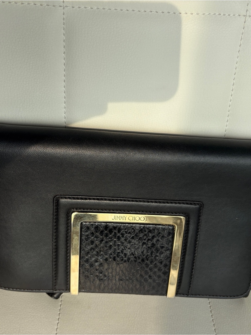 Jimmy Choo Black Leather Clutch with Gold Frame and Textured Panel